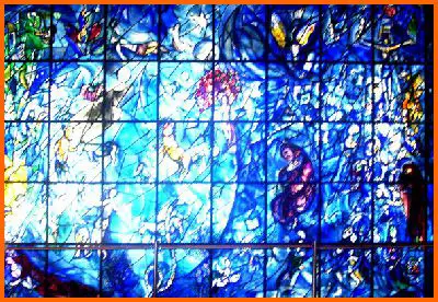 photo of stained glass window at the United Nations building in NY by Marc Chagall