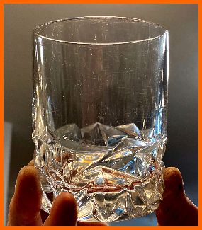 Crystal glass with stains removed by polishing